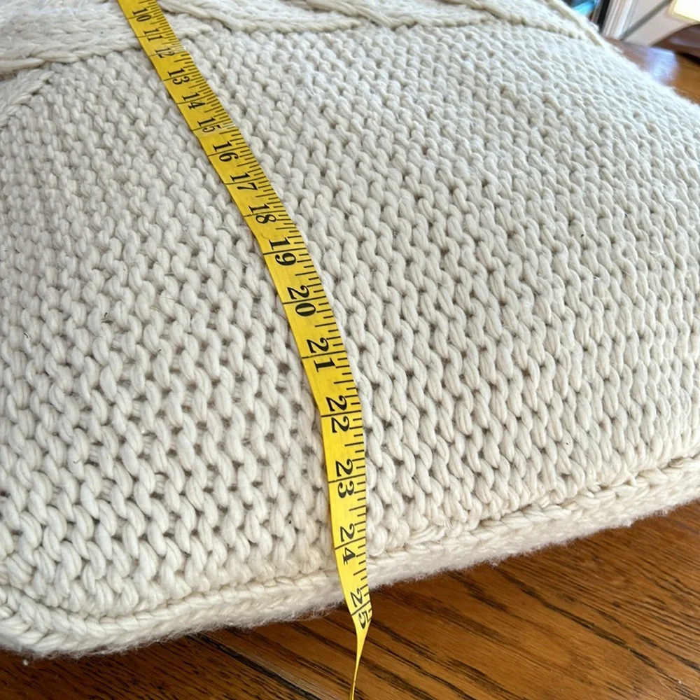Chunky cable knit 24” square accent pillow. Cream color. Great condition.